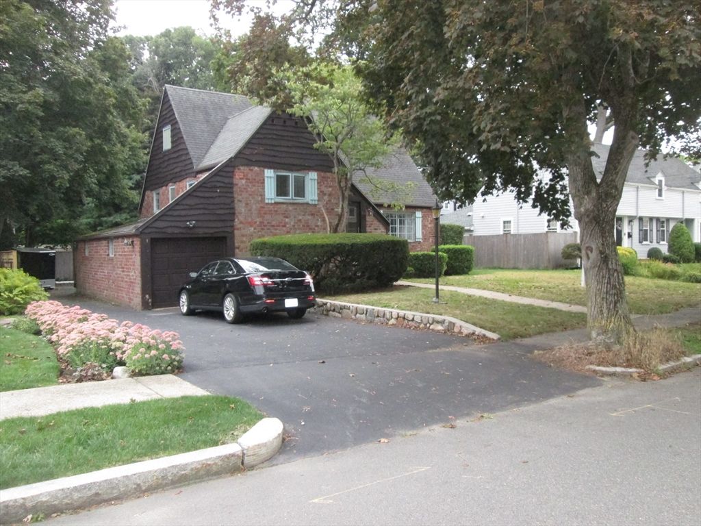 Attached, Exterior, Facade, Brick Facade, Tudor Revival