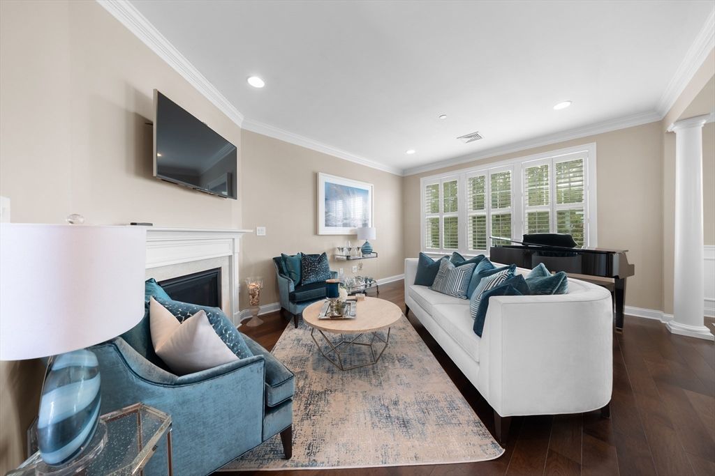 Fireplace, Interior, Living room, Piano, Recessed Lighting, Wood Texture Flooring