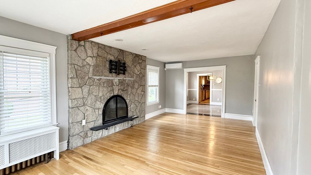 Empty room, Fireplace, Interior, Stone Walls, Wooden Beams, Wood Texture Flooring