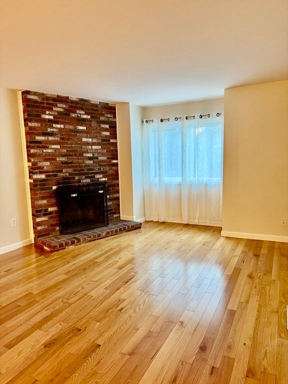 Empty room, Fireplace, Interior, Stone Walls, Wood Texture Flooring