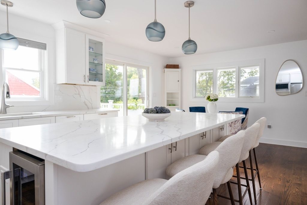 Interior, Kitchen, Marble Walls, Pendant Lights, Recessed Lighting, Wood Texture Flooring