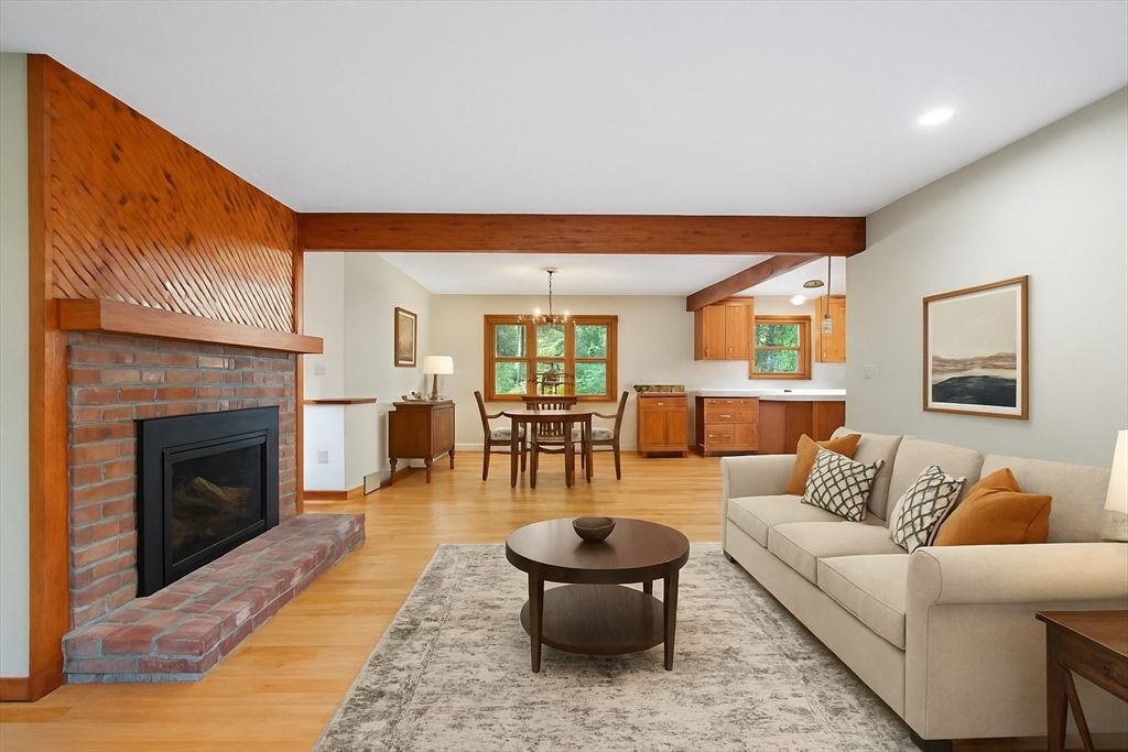 Dining room, Fireplace, Interior, Living room, Pendant Lights, Recessed Lighting, Wooden Beams, Wood Texture Flooring