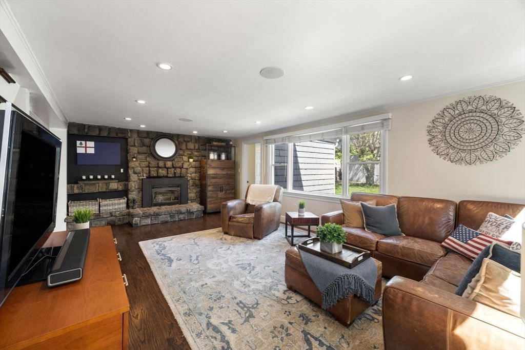 Fireplace, Interior, Living room, Recessed Lighting, Stone Walls, Wood Texture Flooring
