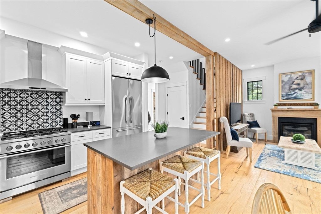 Fireplace, Interior, Kitchen, Pendant Lights, Recessed Lighting, Stainless Steel Appliances, Wooden Beams, Wood Texture Flooring
