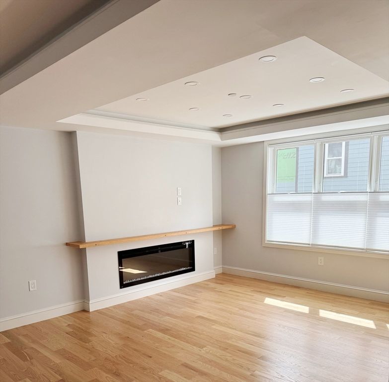 Empty room, Fireplace, Interior, Recessed Lighting, Wood Texture Flooring