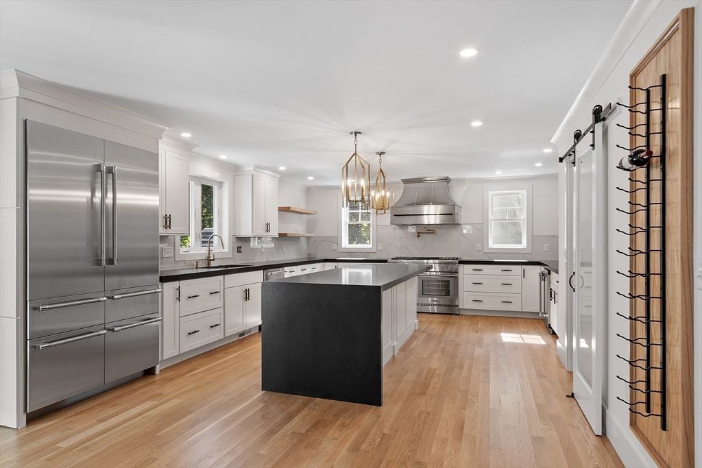 Chandelier, Interior, Kitchen, Pendant Lights, Recessed Lighting, Stainless Steel Appliances, Wood Texture Flooring