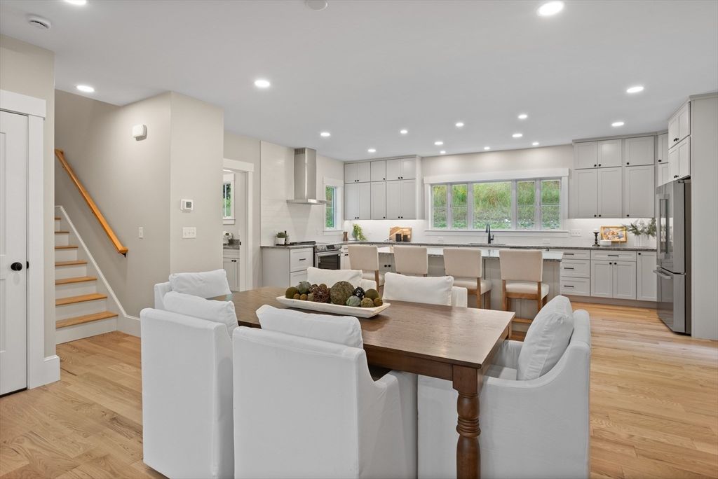 Dining room, Interior, Kitchen, Living room, Recessed Lighting, Stainless Steel Appliances, Wood Texture Flooring