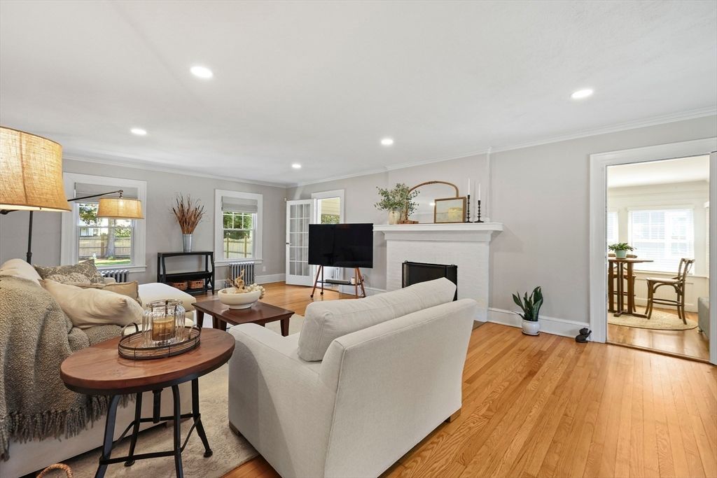 Dining room, Fireplace, Interior, Living room, Recessed Lighting, Wood Texture Flooring