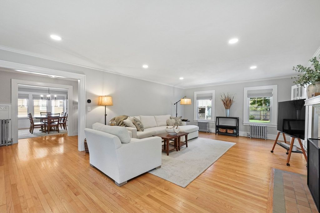 Dining room, Fireplace, Interior, Living room, Recessed Lighting, Wood Texture Flooring