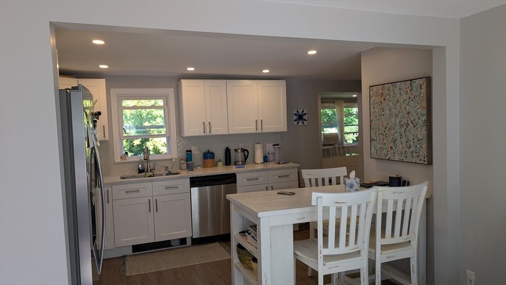 Dining room, Interior, Kitchen, Recessed Lighting, Stainless Steel Appliances, Wood Texture Flooring
