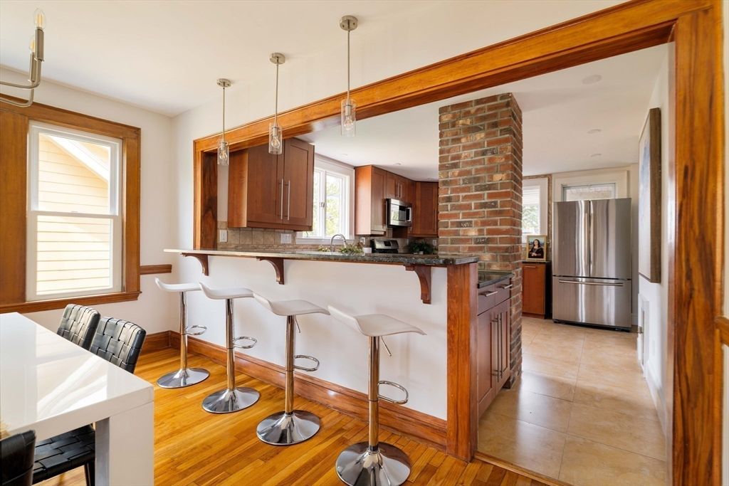 Interior, Kitchen, Pendant Lights, Stainless Steel Appliances, Stone Walls, Wood Texture Flooring