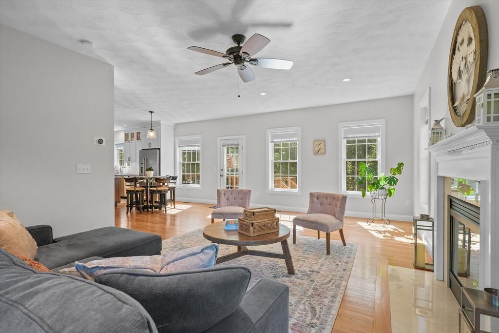 Dining room, Fireplace, Interior, Living room, Pendant Lights, Recessed Lighting, Wood Texture Flooring