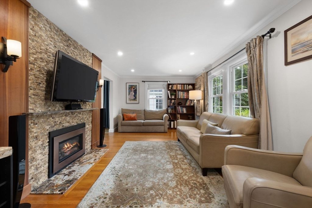 Fireplace, Interior, Living room, Recessed Lighting, Stone Walls, Wood Texture Flooring