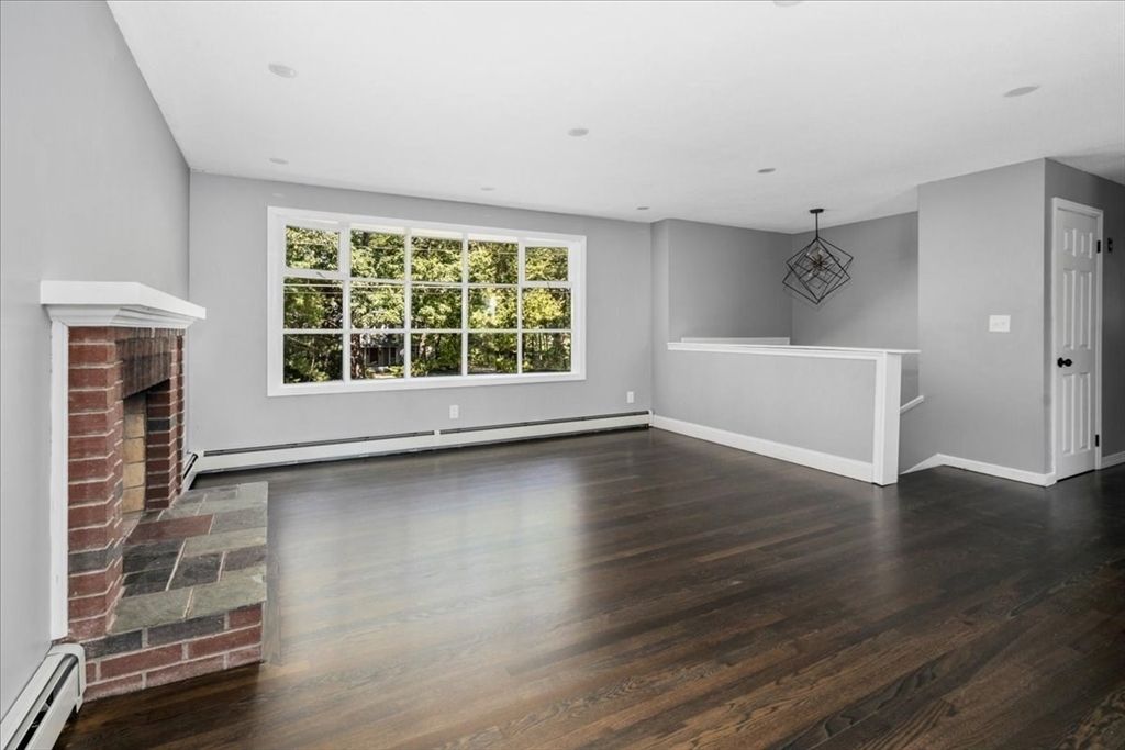 Empty room, Fireplace, Interior, Pendant Lights, Recessed Lighting, Wood Texture Flooring