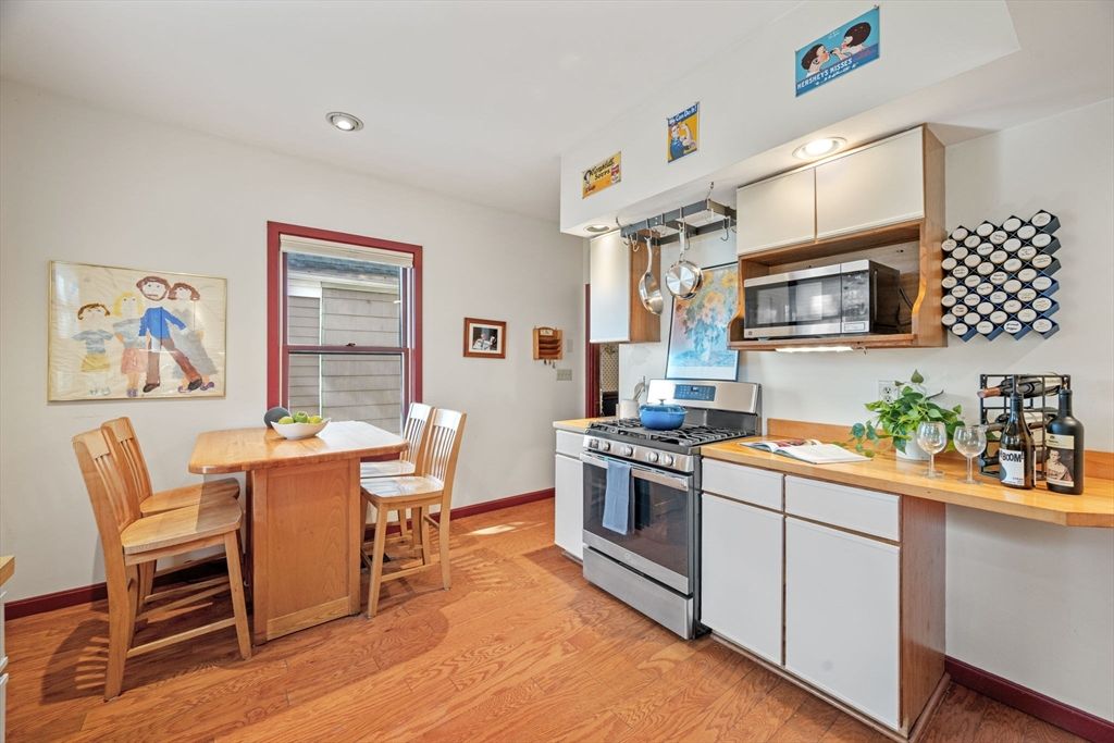 Dining room, Interior, Kitchen, Recessed Lighting, Stainless Steel Appliances, Wood Texture Flooring