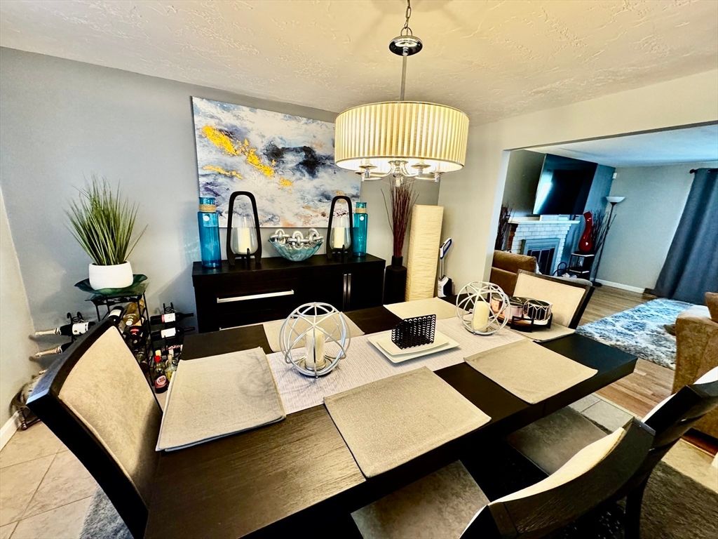 Chandelier, Dining room, Fireplace, Interior, Living room