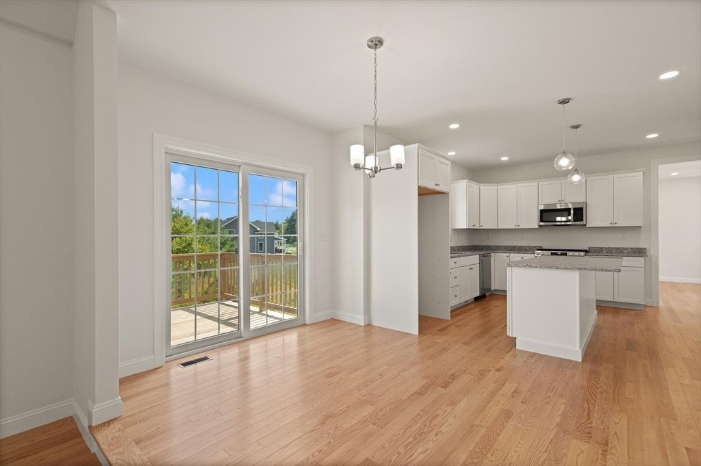 Chandelier, Interior, Kitchen, Pendant Lights, Recessed Lighting, Stainless Steel Appliances, Wood Texture Flooring
