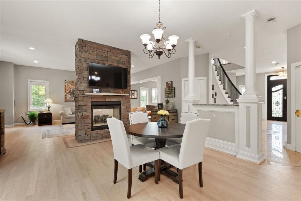 Chandelier, Dining room, Fireplace, Interior, Recessed Lighting, Wood Texture Flooring