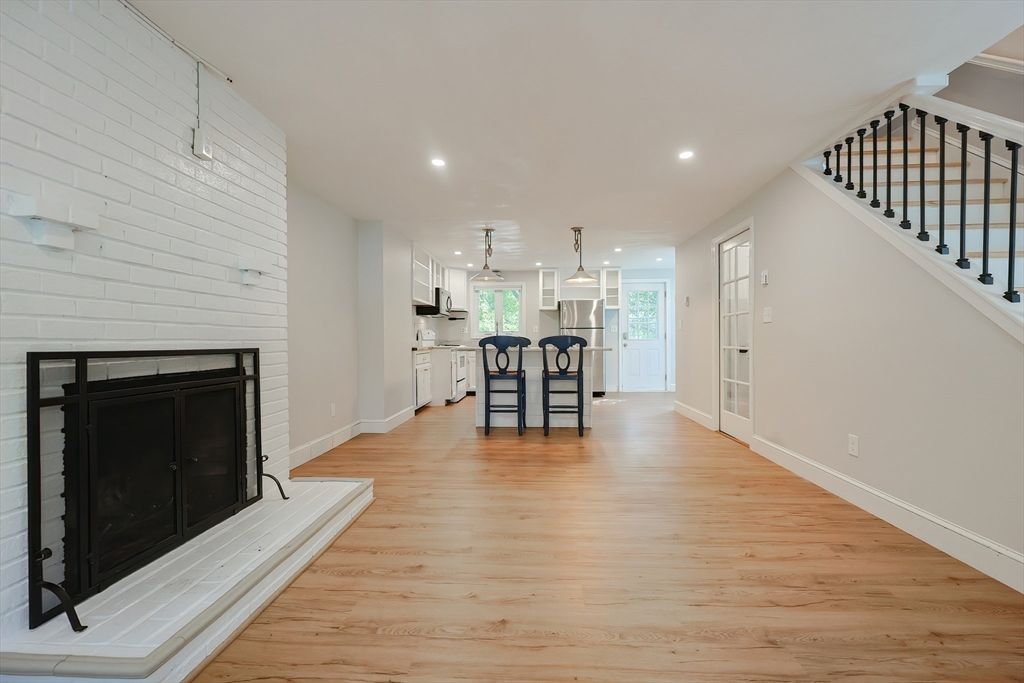 Dining room, Fireplace, Interior, Kitchen, Pendant Lights, Recessed Lighting, Wood Texture Flooring