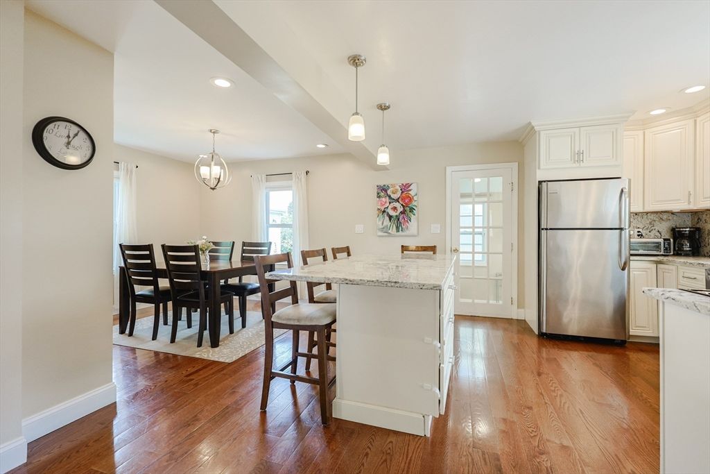 Dining room, Interior, Kitchen, Pendant Lights, Recessed Lighting, Stainless Steel Appliances, Wood Texture Flooring