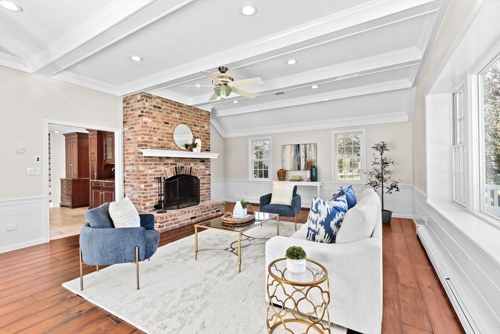 Fireplace, Interior, Living room, Recessed Lighting, Stone Walls, Wood Texture Flooring