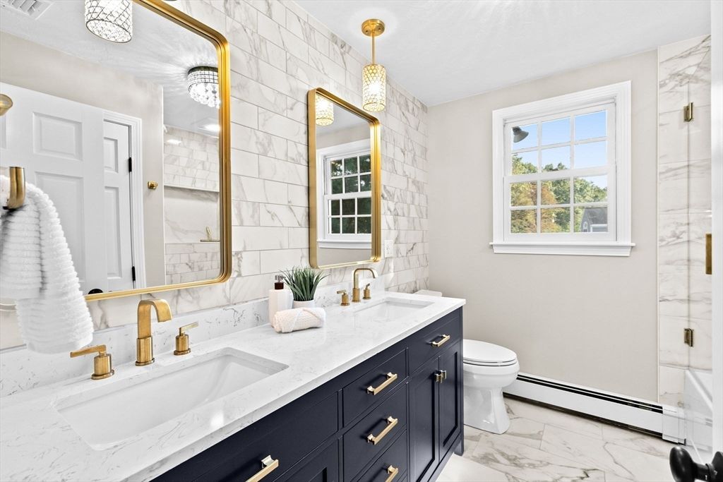 Bathroom, Dual Sink Vanities, Glass Shower, Interior, Marble, Marble Walls, Pendant Lights