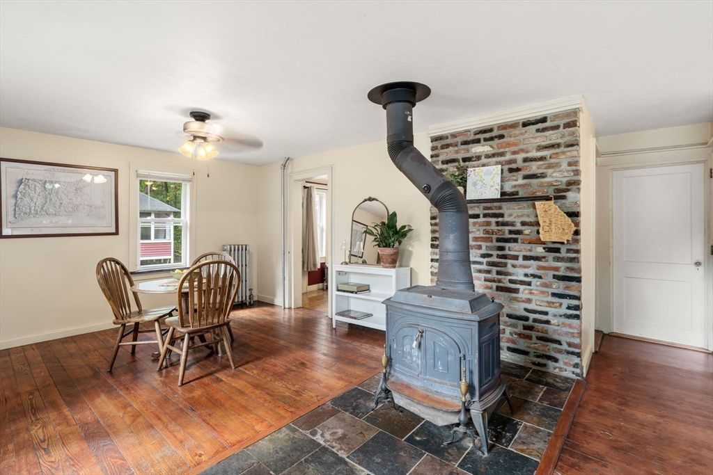 Dining room, Fireplace, Interior, Stone Walls, Wood Texture Flooring