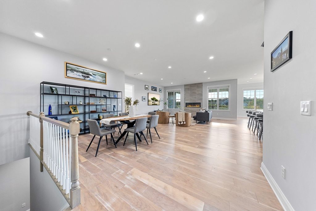 Dining room, Fireplace, Interior, Living room, Recessed Lighting, Wood Texture Flooring