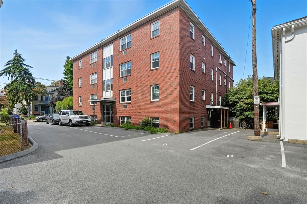 Exterior, Facade, Brick Facade, Condo Building