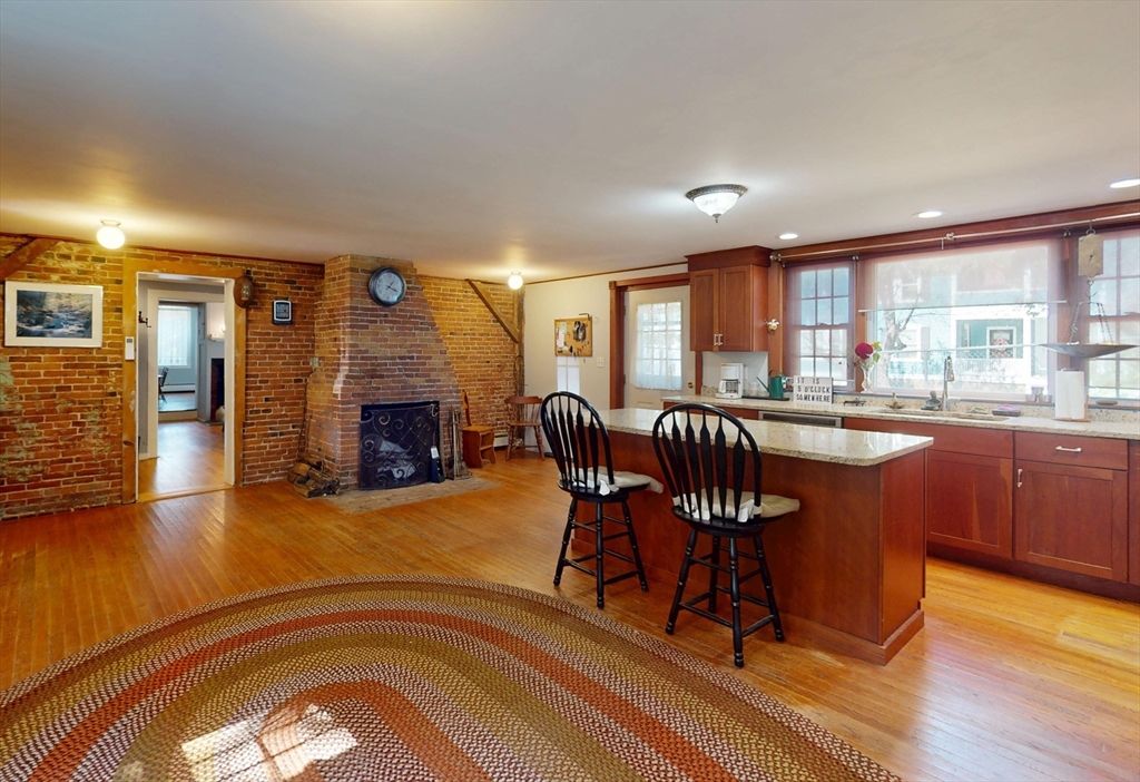 Fireplace, Interior, Kitchen, Recessed Lighting, Stone Walls, Wood Texture Flooring