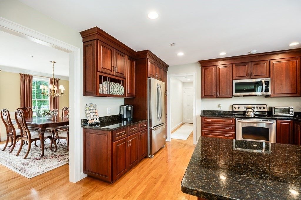 Chandelier, Dining room, Interior, Kitchen, Recessed Lighting, Stainless Steel Appliances, Wood Texture Flooring