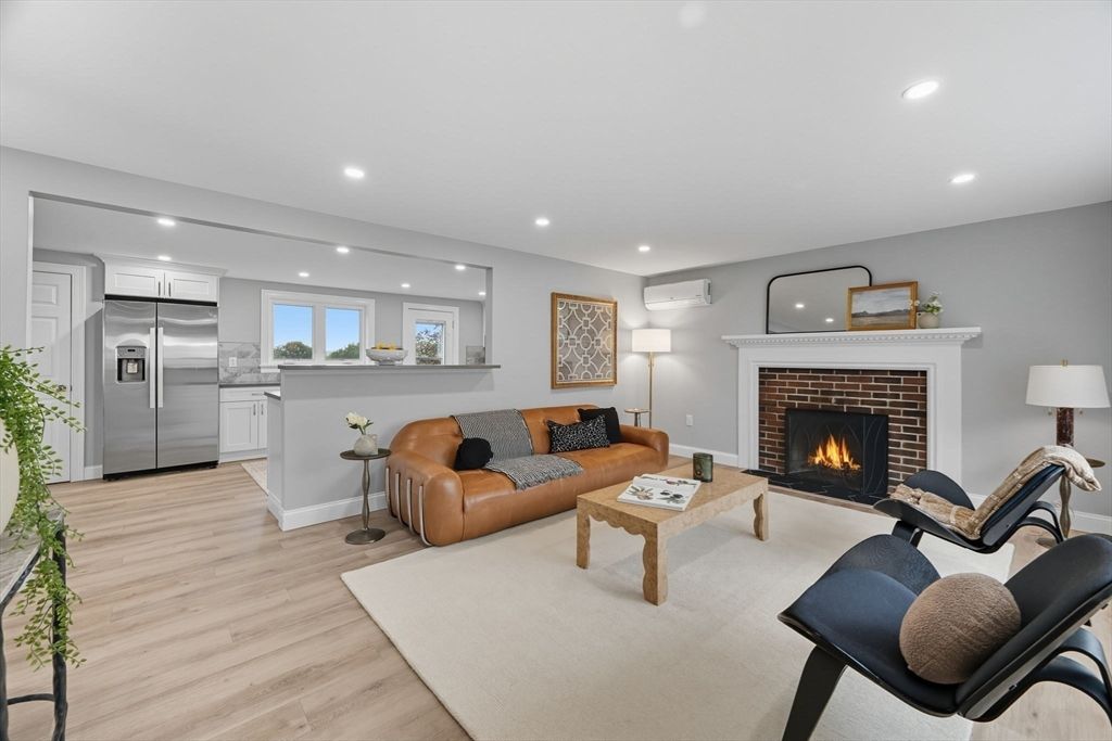 Fireplace, Interior, Kitchen, Living room, Recessed Lighting, Stainless Steel Appliances, Wood Texture Flooring