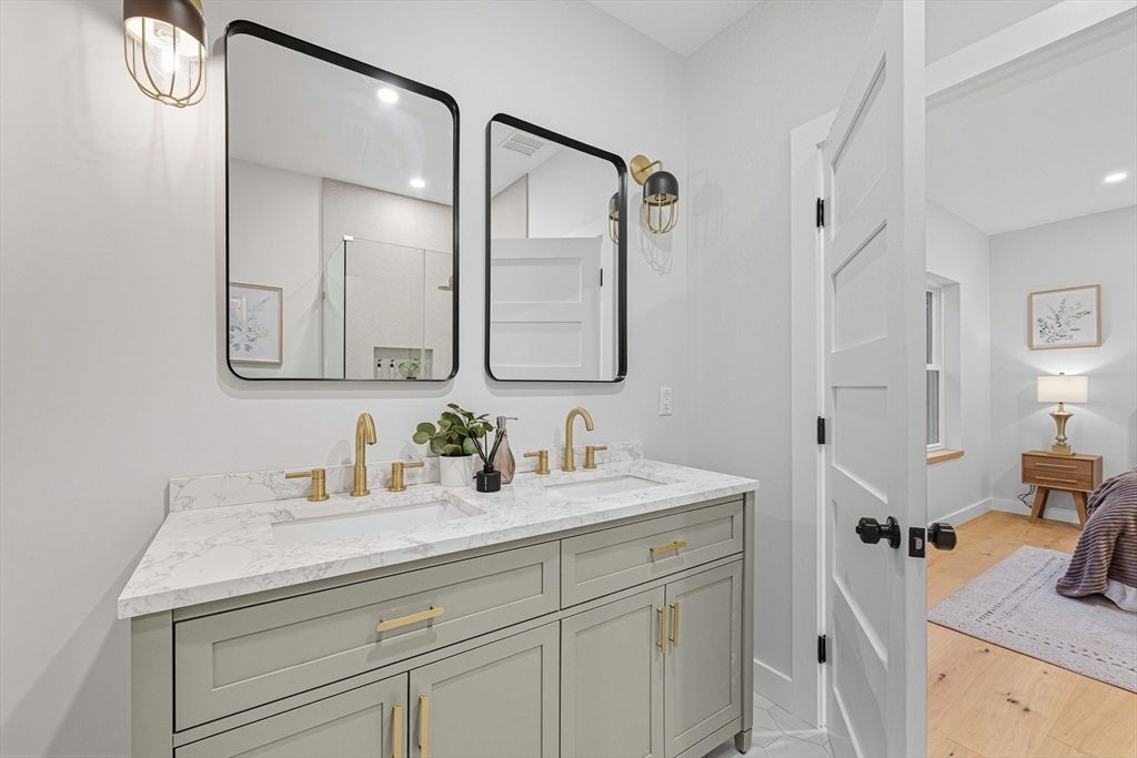 Bathroom, Dual Sink Vanities, Interior, Recessed Lighting, Wood Texture Flooring