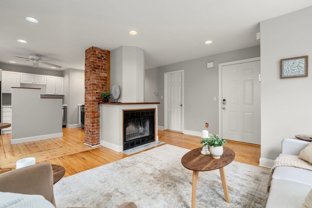 Fireplace, Interior, Kitchen, Recessed Lighting, Stone Walls, Wood Texture Flooring
