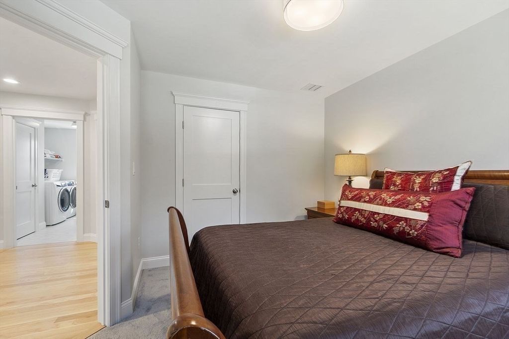 Bedroom, Interior, Recessed Lighting, Utility Closets, Washer, Wood Texture Flooring