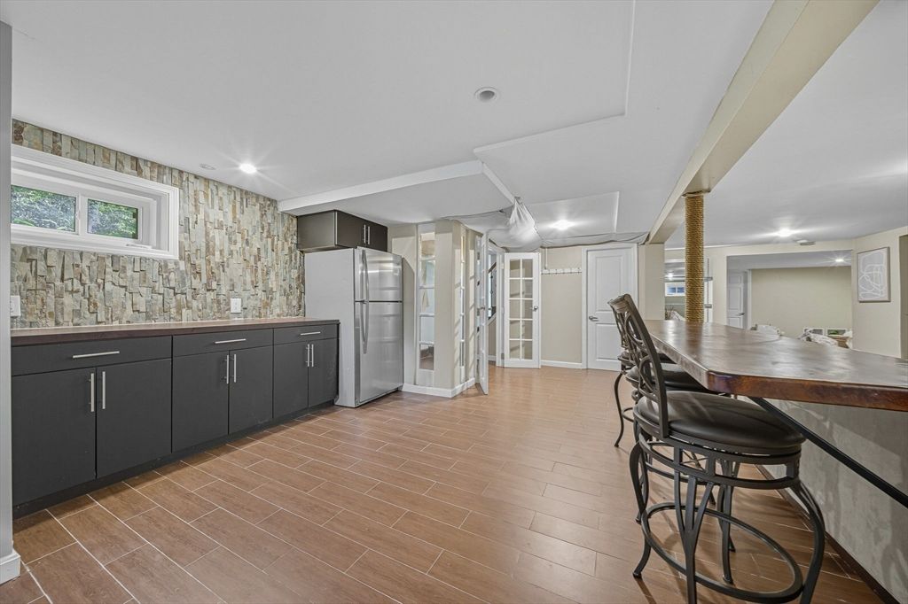 Dining room, Interior, Kitchen, Recessed Lighting, Stainless Steel Appliances, Wood Texture Flooring