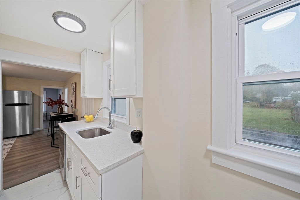 Interior, Kitchen, Marble, Recessed Lighting, Stainless Steel Appliances, Wood Texture Flooring