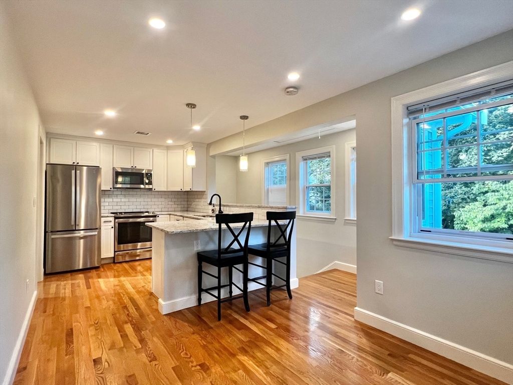 Interior, Kitchen, Pendant Lights, Recessed Lighting, Stainless Steel Appliances, Wood Texture Flooring