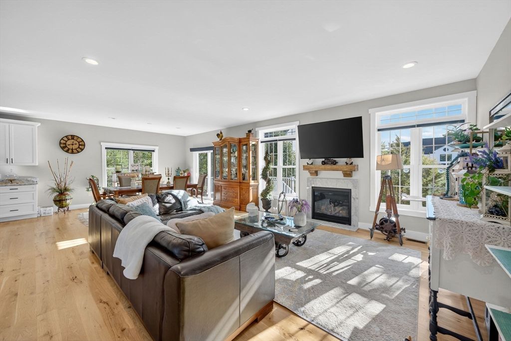 Dining room, Fireplace, Interior, Living room, Recessed Lighting, Wood Texture Flooring