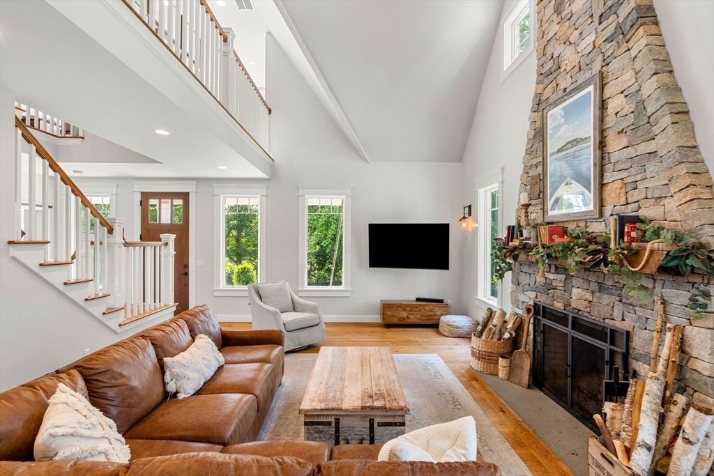 Fireplace, Interior, Living room, Recessed Lighting, Stone Walls, Wood Texture Flooring