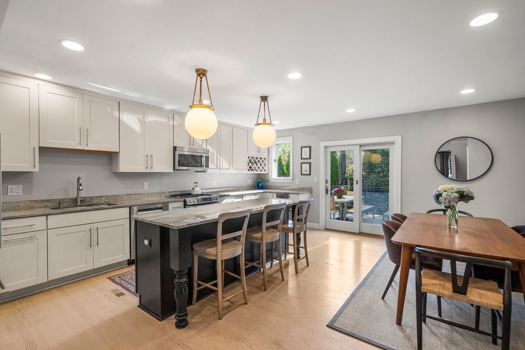 Dining room, Interior, Kitchen, Pendant Lights, Recessed Lighting, Stainless Steel Appliances, Wood Texture Flooring