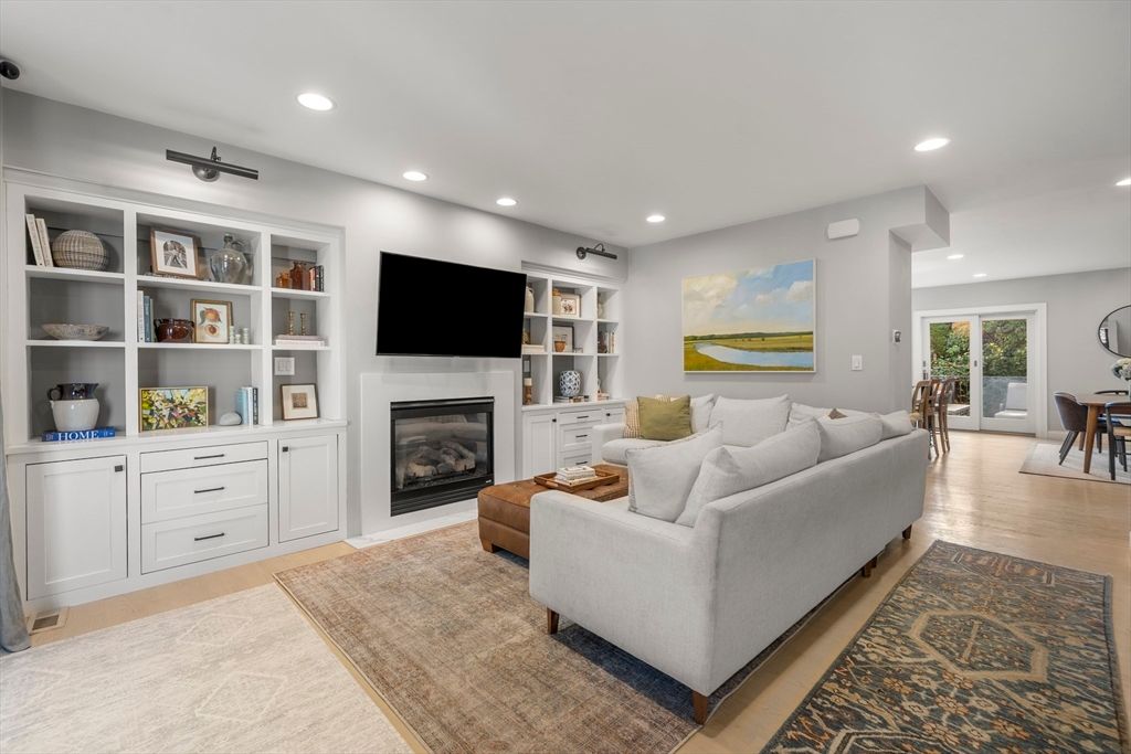 Dining room, Fireplace, Interior, Living room, Recessed Lighting, Wood Texture Flooring