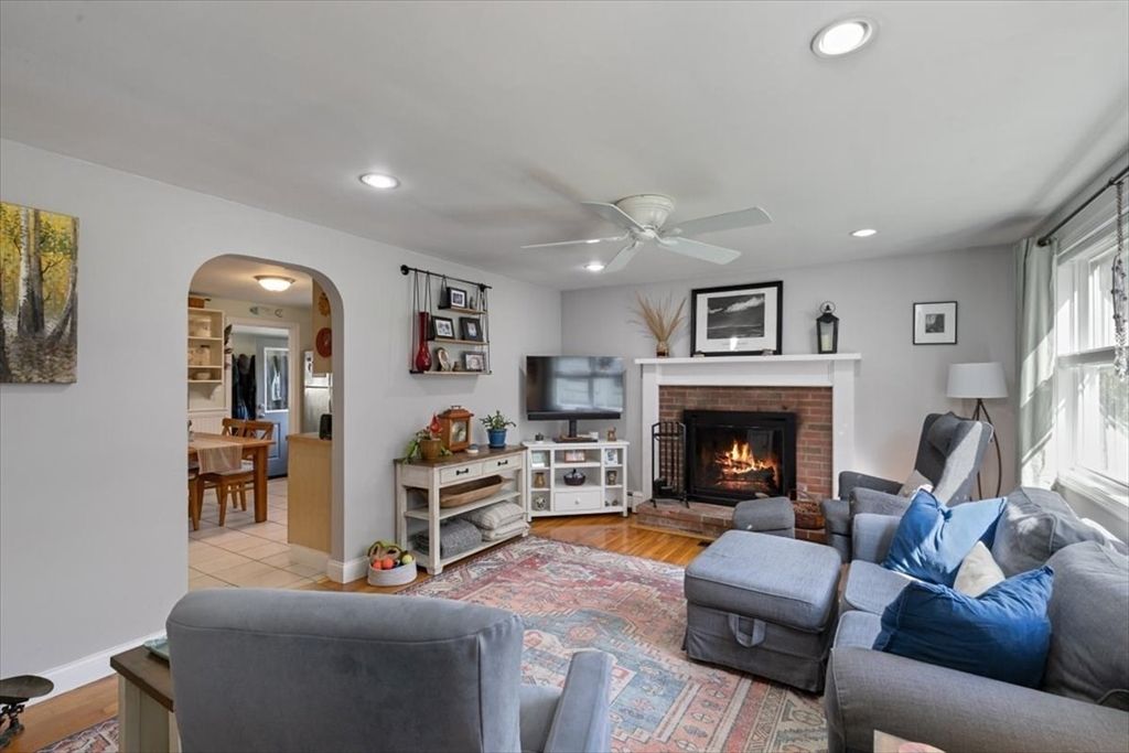 Dining room, Fireplace, Interior, Living room, Recessed Lighting, Wood Texture Flooring