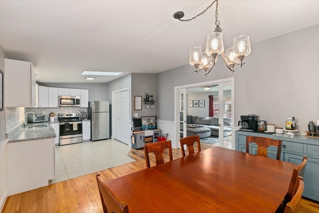 Chandelier, Dining room, Interior, Kitchen, Living room, Recessed Lighting, Stainless Steel Appliances, Wood Texture Flooring