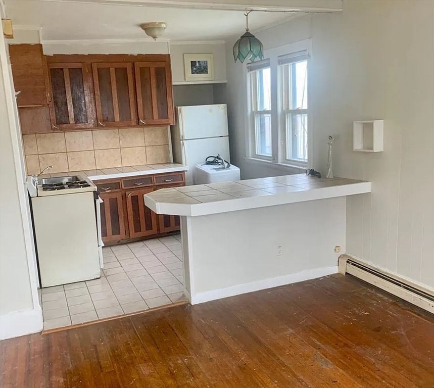 Interior, Kitchen, Tile Countertops, Wood Texture Flooring