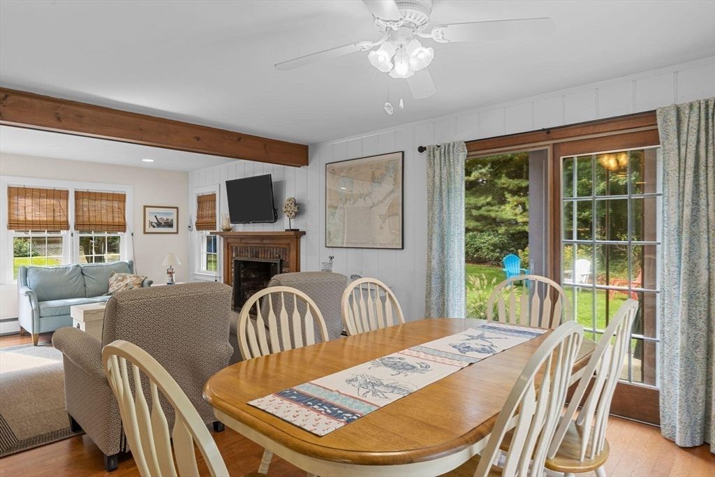 Dining room, Fireplace, Interior, Living room, Recessed Lighting, Wooden Beams, Wood Texture Flooring
