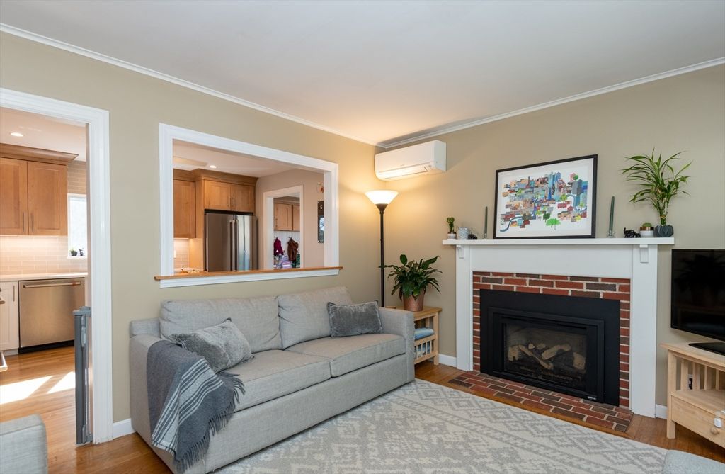 Fireplace, Interior, Kitchen, Recessed Lighting, Stainless Steel Appliances, Wood Texture Flooring