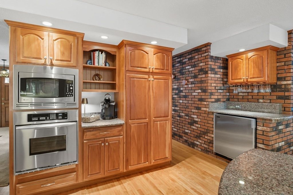 Interior, Kitchen, Recessed Lighting, Stainless Steel Appliances, Stone Walls, Wood Texture Flooring