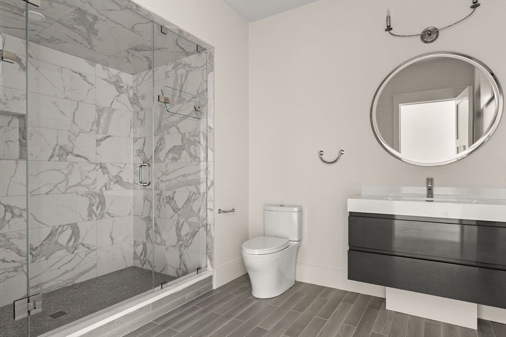 Bathroom, Glass Shower, Interior, Marble Walls, Wood Texture Flooring