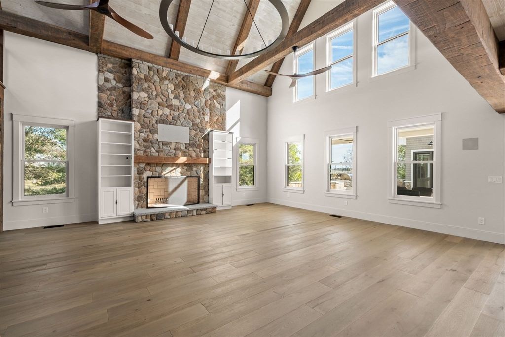 Empty room, Fireplace, Interior, Pendant Lights, Stone Walls, Wooden Beams, Wood Texture Flooring